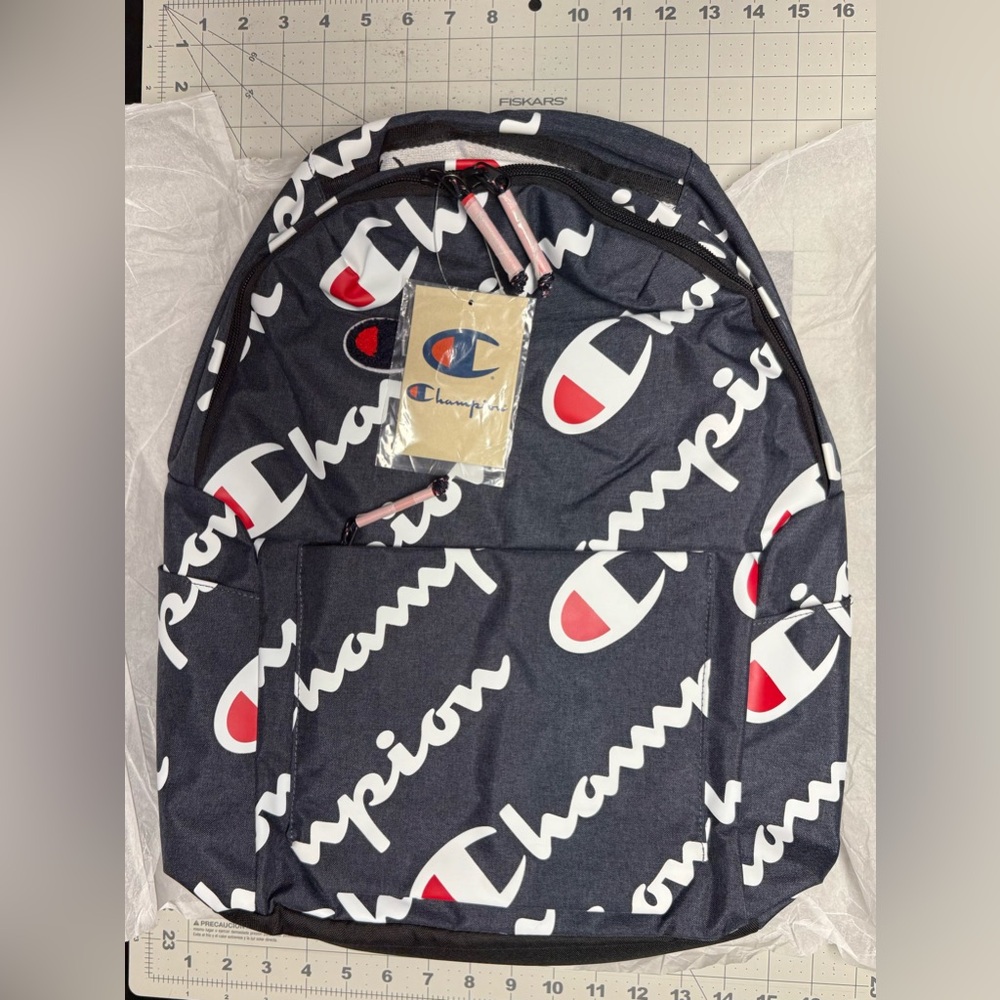 Champion Black and White Backpack with Red Accents